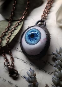 Image 1 of Prosthetic Eye Pendant - Light Blue