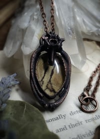 Image 1 of Skin and Bone Amulet - Ball Python