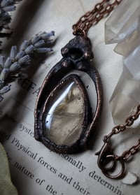 Image 2 of Piglet Bone & Rutilated Quartz Amulet