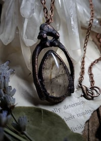 Image 5 of Piglet Bone & Rutilated Quartz Amulet