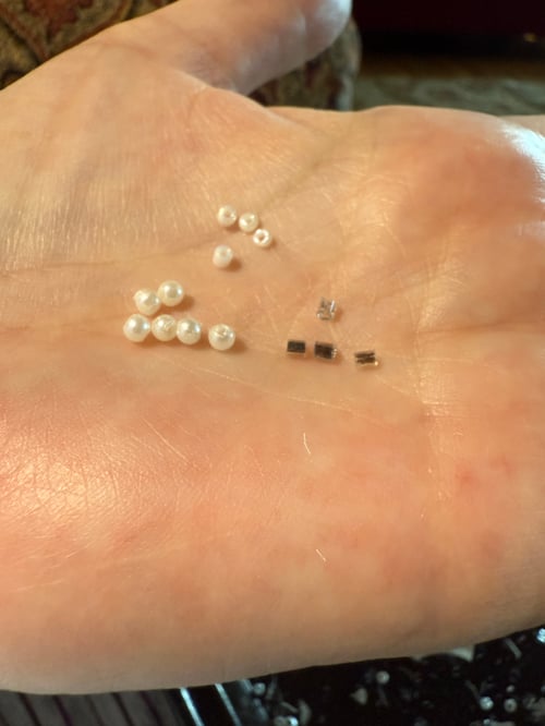 Image of Strip of various beads from dress