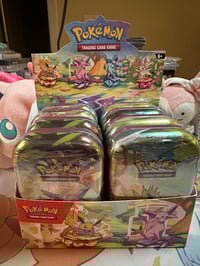 Prismatic Evolutions Mini Tin