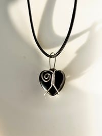 Image 1 of Stabilizing Black Heart Wraps
