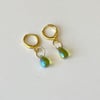 iridescent green glass teardrop huggie hoop earrings