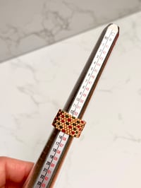 Image 1 of Gold/Red/Green Size 7 (Aprox), Two side Ring 