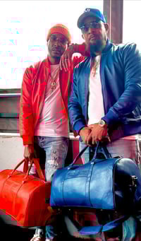Image 2 of Blue Leather Jacket & Airport Bag