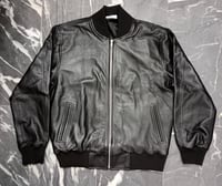 Image 1 of Black Leather Jacket & Airport Bag