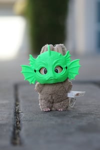 Image 1 of Little Miss Swamp monster labubu mask.