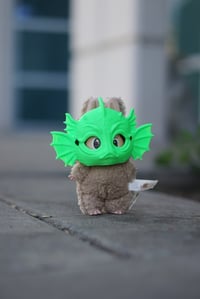 Image 2 of Little Miss Swamp monster labubu mask.