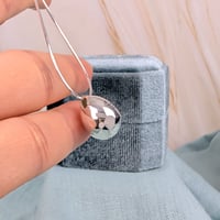 Image 2 of Drops of one stream Bahá'í necklace with Greatest Name symbol in sterling silver