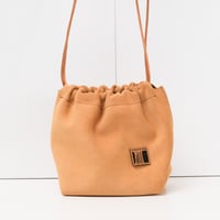 Image 1 of Scrunchy Suede Sling in muted butter