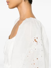 Image 1 of PINKO broderie anglaise mini dress. Effortless European Glamour