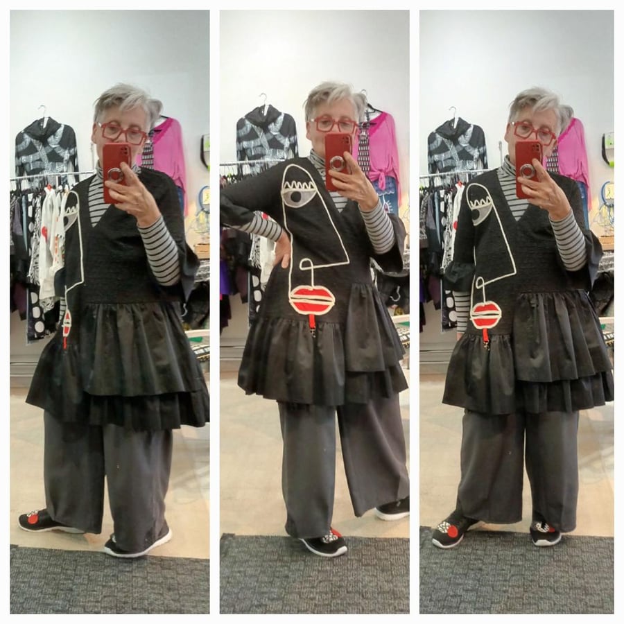 Image of black tunic, applique face, one of a kind