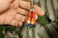 Image 1 of Red long hat clown