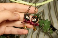 Image 1 of Black ribbon cats