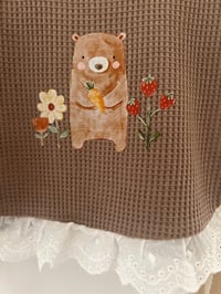 Image 2 of Brown Cotton Baby Bib with Bear, flowers and strawberries 🧸