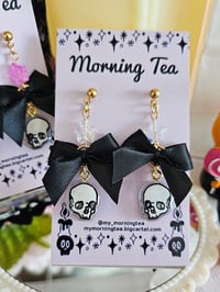 Image 3 of Coquette Skull Earrings