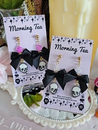 Image 2 of Coquette Skull Earrings