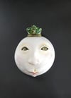 Wall mask with crown