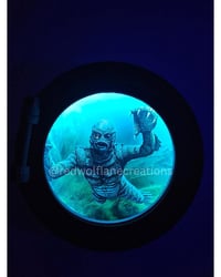 Image 1 of Large Light-Up Creature from the Black Lagoon Porthole (13.5")
