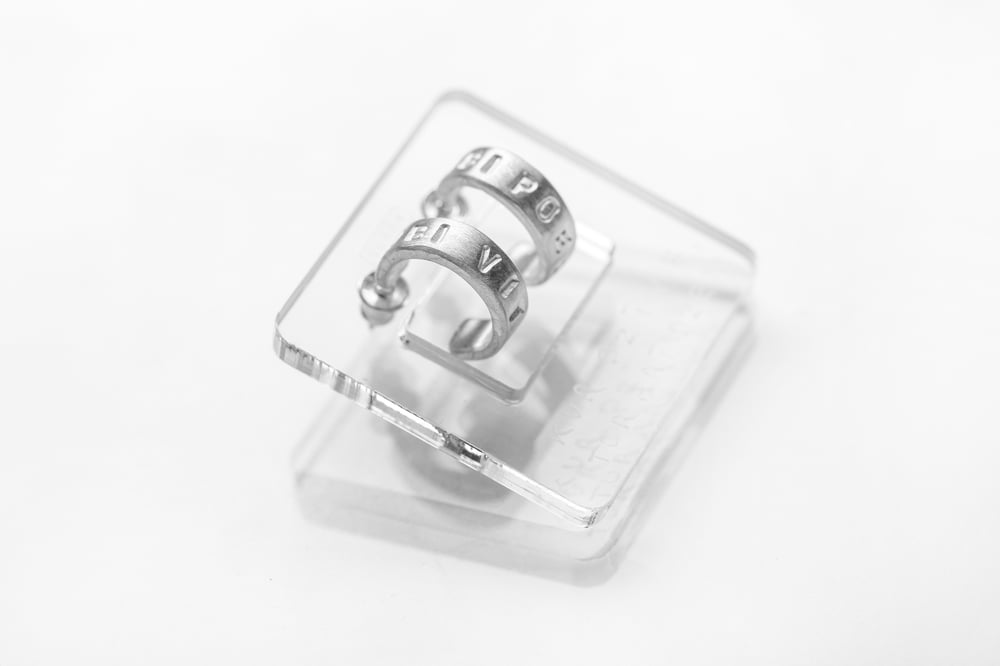 Image of Round silver earrings with inscription in Latin