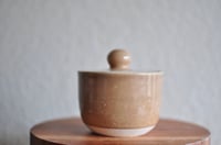 Image 1 of Tan Lidded Jar