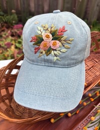 Image 2 of Pink hand embroidered flowers on an adjustable light blue jean hat