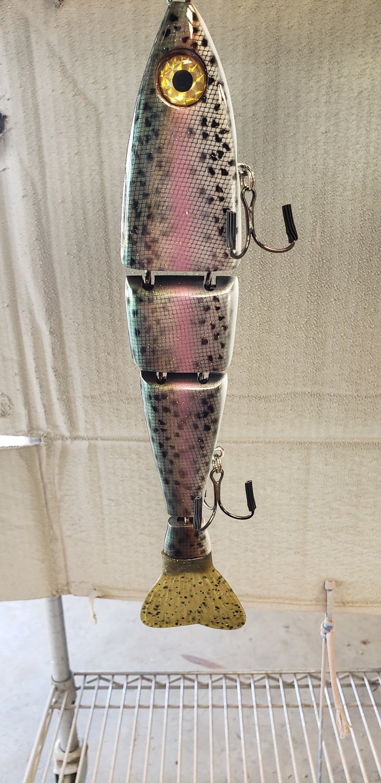 Image of FLOATING 11 inch cut tail. 5ozs. Scaled Dark Trout. stencil dots.