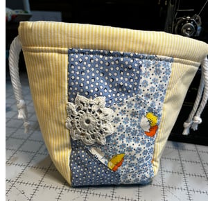 Image of Yellow and Blue Quilted Drawstring Bag