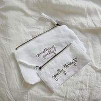 hand stitched white linen pouches 