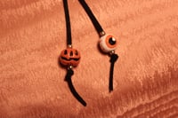 Image 3 of Skull Bolo Tie (Pearl beads)