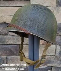 Image 1 of WWII 517th PRCT Airborne McCord Fixed Bale Front Seam Helmet Seaman Paper Co. Liner.