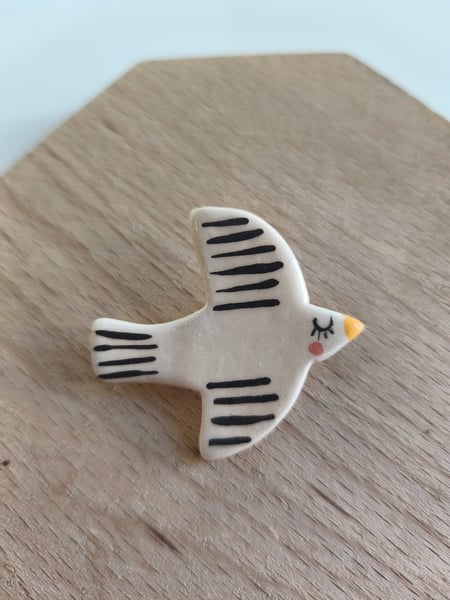 Image of  Broche oiseau  noir et blanc 
