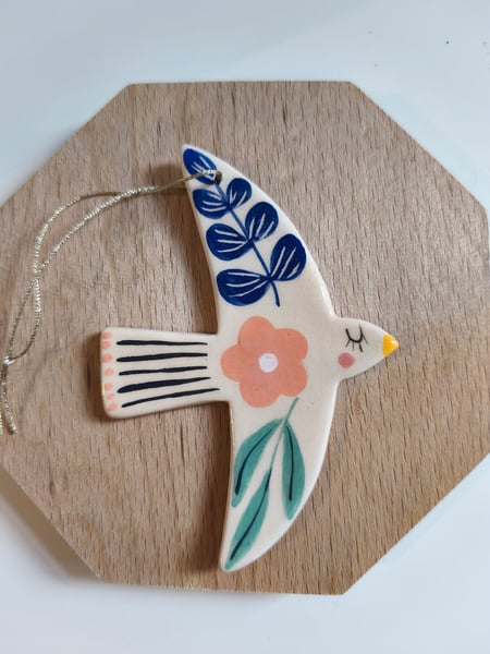 Image of   Suspension oiseau rose bleu 