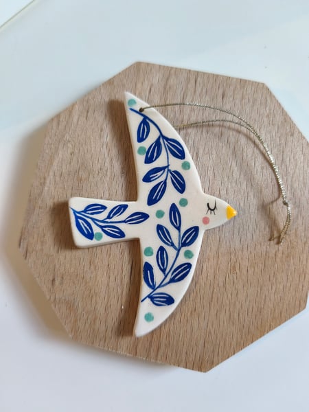 Image of   Suspension oiseau feuillage bleu 