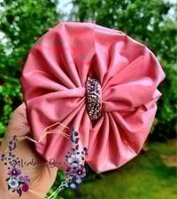 Image 2 of Mystery pleather bows