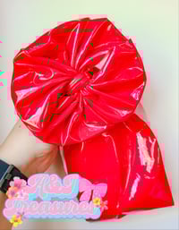 Image 4 of Mystery pleather bows