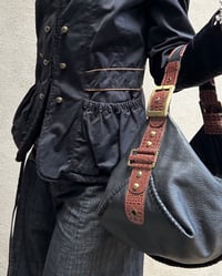 Image 5 of BLACK AND BROWN LEATHER BUCKLE BAG