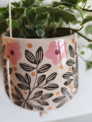 Image of  Pot suspendu feuillage brun 
