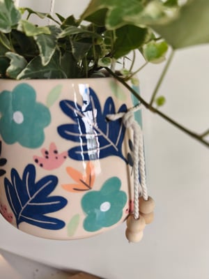 Image of    Pot suspendu fleur bleue 