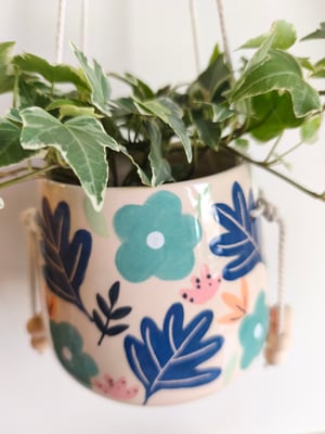 Image of    Pot suspendu fleur bleue 