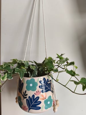 Image of    Pot suspendu fleur bleue 