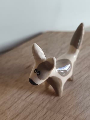 Image of Petit chien beige gris 