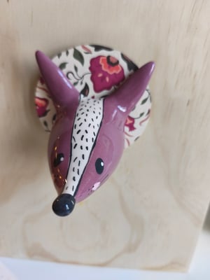 Image of  Trophée loup prune