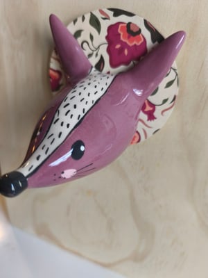 Image of  Trophée loup prune