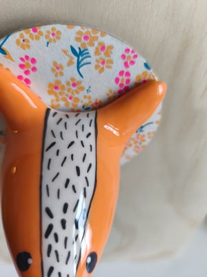 Image of  Trophée loup orange