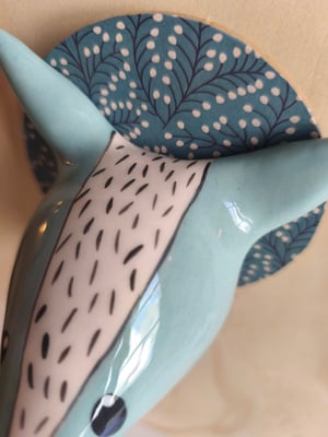 Image of  Trophée loup bleu ciel 