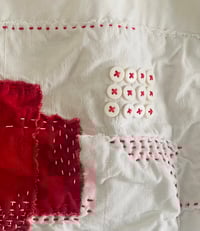 Image 1 of red cross bucket bag