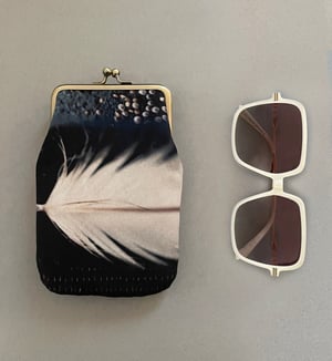 Image of White feather and barnacles, velvet glasses case with kisslock frame