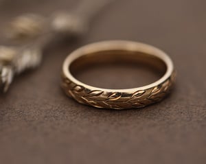 Image of 9ct gold 4mm ‘Olive leaf’ engraved court ring
